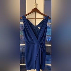 Dressy faux wrap romper in royal blue!